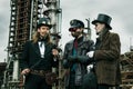 Three mans in steampunk style