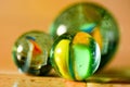 Three marbles closeup Royalty Free Stock Photo