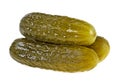 Three marinated pickled cucumbers on white background