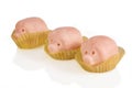 Three marzipan pigs