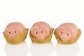 Three marzipan pigs