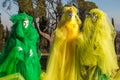 Three mask green and yellow in the medieval village of Castiglion Fibocchi, Tuscany