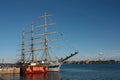 Three-masted schooner moored to the dock