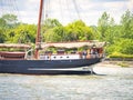 Three masted schooner Oosterschelde under sails on the Seine river for Armada exhibition in France. Cross processed Royalty Free Stock Photo