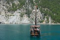 A three-masted tourist yacht sails on the lake near the Oymapinar dam. Green canyon, Manavgat, Antalya, Turkey Royalty Free Stock Photo