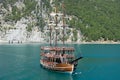 A three-masted tourist yacht sails on the lake near the Oymapinar dam. Green canyon, Manavgat, Antalya, Turkey Royalty Free Stock Photo