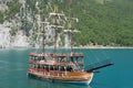 A three-masted tourist yacht sails on the lake near the Oymapinar dam. Green canyon, Manavgat, Antalya, Turkey Royalty Free Stock Photo