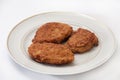 Three meatballs on a white plate Royalty Free Stock Photo