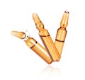 Three medical or cosmetic ampoules close-up isolated on a white background