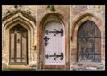 Three medieval doors in a triptych Royalty Free Stock Photo