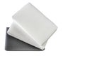 Three melamine sponges on a white background