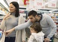 Family buying groceries in the local supermarket Royalty Free Stock Photo