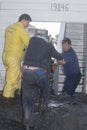 Three men dealing with the affects of the mudslide