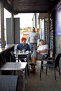 Three men enjoying a beverage break.