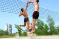 Three men play beach - fight Royalty Free Stock Photo