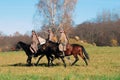 Three men ride horses Royalty Free Stock Photo