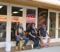 Three men at tattoo shop during Sturgis, SD 77th Rally