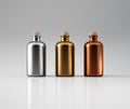 Three metallic bottles