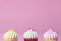 Three Mini Fancy cupcake on pink background