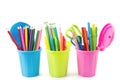 Three miniature dustbins with stationery Royalty Free Stock Photo