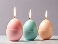 three minimalist easter egg candles, pastel color
