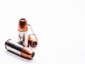 Three 9mm hollow point bullets on a white background Royalty Free Stock Photo
