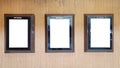 Three Mock up poster frames on Cinema wall Royalty Free Stock Photo
