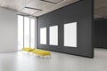 Three mock up posters in gray gallery corner Royalty Free Stock Photo