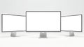 Three modern computer monitors arranged in a row on a white background screen display Royalty Free Stock Photo