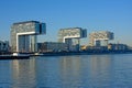 Three Modern L-shaped apartment buildings along river rhine, Cologne