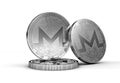 Three Monero XMR cryptocurrency physical concept coin isolated on white background.