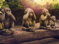 Monkeys statues which have different posts. Royalty Free Stock Photo