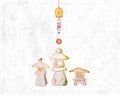 Three mossy stone toro lanterns and furin bell with sakura blossom. Japanese zen garden composition on vintage rice