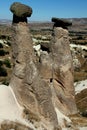 Three mountains (also called Fairy Chimneys or Three Beauties) near the town of Urgup in Cappadocia, Turkey Royalty Free Stock Photo