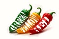 Three multi-colored pods of hot pepper