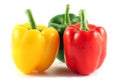 Three multi-coloured pepper