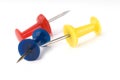 Three multicolored push pins Royalty Free Stock Photo