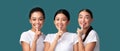 Three Multiracial Girls Gesturing Finger On Lips Sign, Studio, Panorama