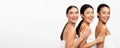 Three Multiracial Women Posing In Bath Towels, White Background, Panorama