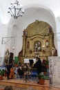 Three musicians ( bass, harpsichord and sackbut ) during the baroque concert in the Santiago el Mayor church