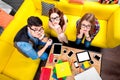 Three nerds on the couch Royalty Free Stock Photo