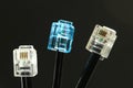 Three network cables with connector on black Royalty Free Stock Photo