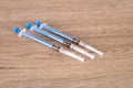 Three new needles are on the table Royalty Free Stock Photo