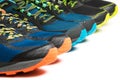 Three new pairs of colourful running shoes / exercise trainers