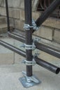 Three new scaffold double fix clamp and scaffold pipes for build the temporary structure