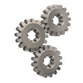 Three nickel gears meshing together Royalty Free Stock Photo