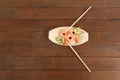 Three nigiri sushi served with chopsticks in wooden boat plate Royalty Free Stock Photo