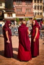 Three nuns of Boudhanath Temple, Kathmandu, Nepal