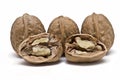 Three nuts and one opened. Royalty Free Stock Photo