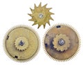 Three old brass gears isolated on white